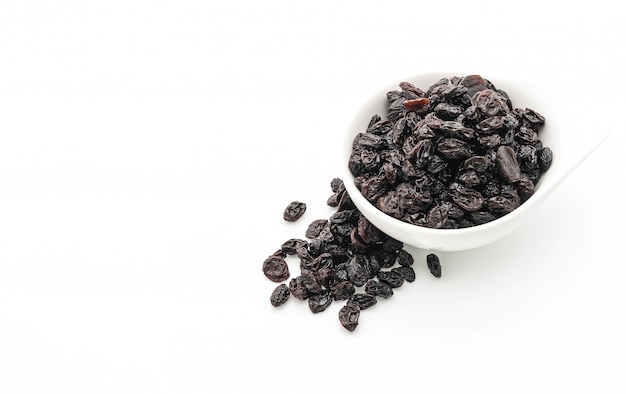 black raisins on white