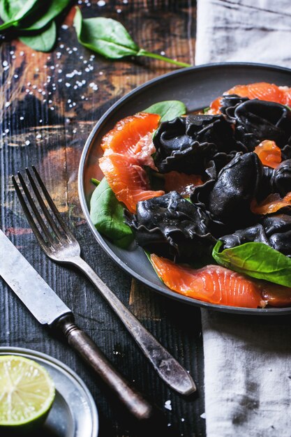 Black ravioli with salted salmon