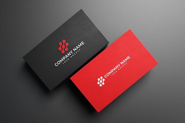 Photo black and red embossed business card on dark background