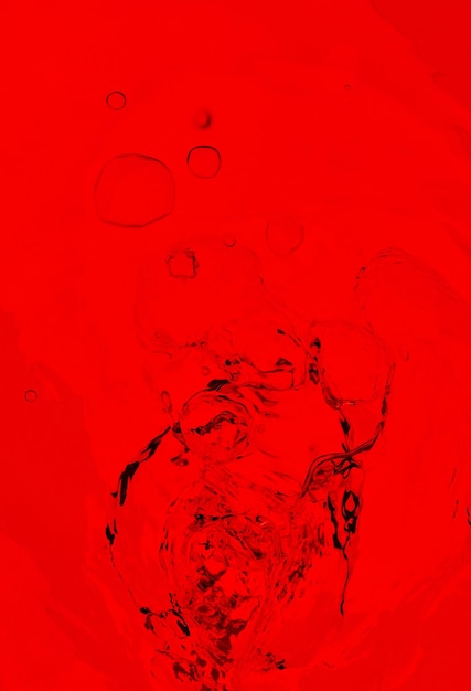 Black and red ink background colorful fog abstract swirling ocean acrylic paint pigment underwater dark smoke