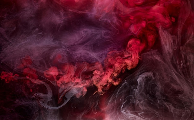 Black and red ink background colorful fog abstract swirling ocean acrylic paint pigment underwater dark smoke