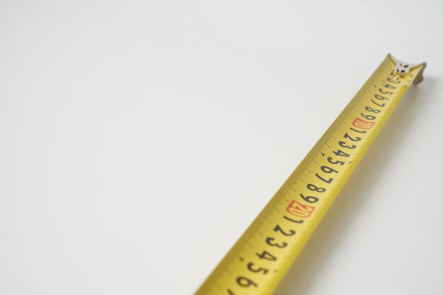 Photo black and red rolling meter on a white background