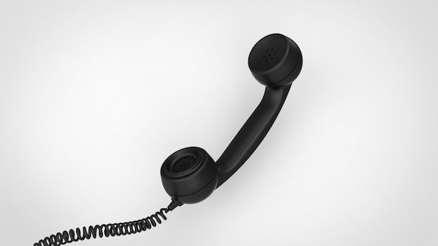 흰색 배경 위에 검은 복고풍 오래 된 전화 송수화기