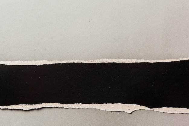 Black ripped paper background