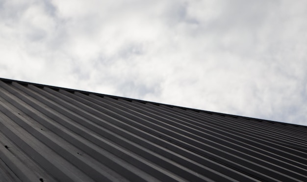 A black roof on sky background