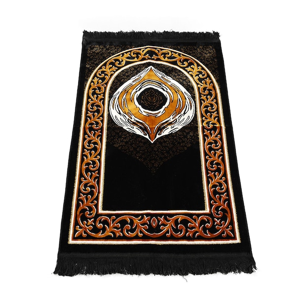 A black rug with a gold and white design on it