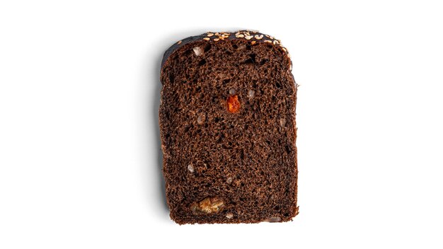 Black, rye bread with dried fruit on a white background