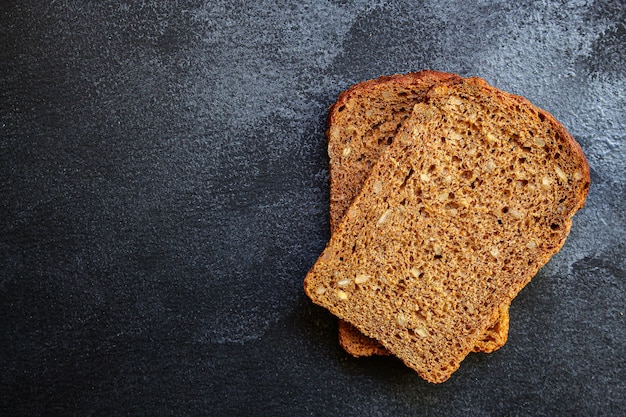 black rye bread with useful additives and seeds
