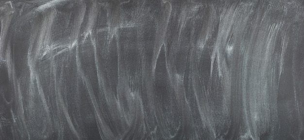 Photo black school board with blurred chalk. blackboard background