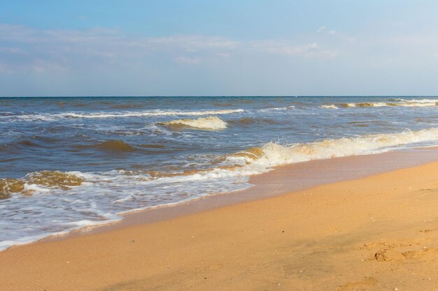 The Black Sea in sunny weather Surf on the beach wavessandy shore