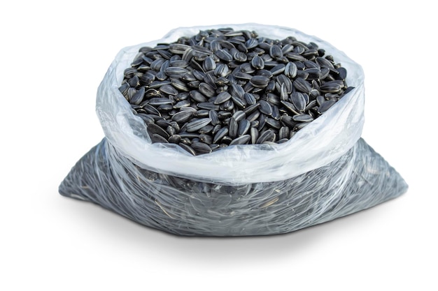 Black seeds in a plastic bag isolated on a white background