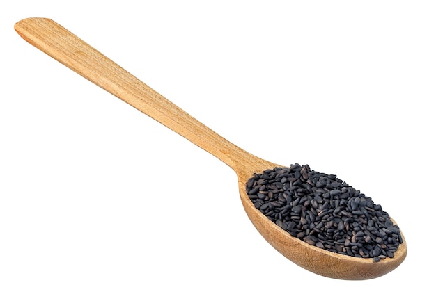 black sesame seeds in wooden spoon isolated on white background