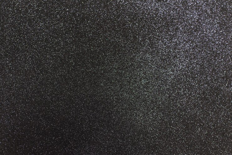 Black shiny background with sparkles. Dark gray abstract festive background