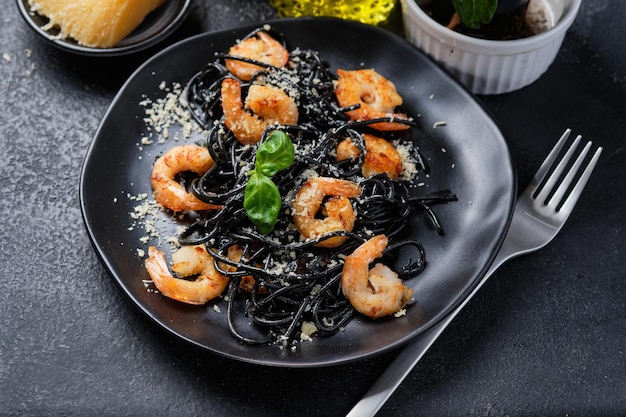 Black shrimp pasta with olive oil and parmesan