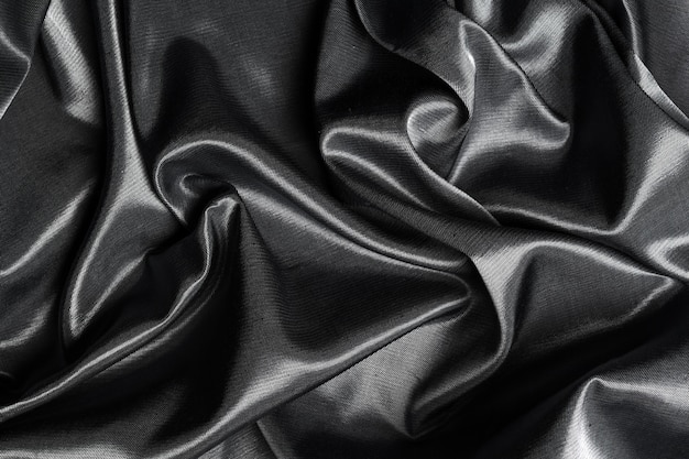 Photo black silk fabric surface background