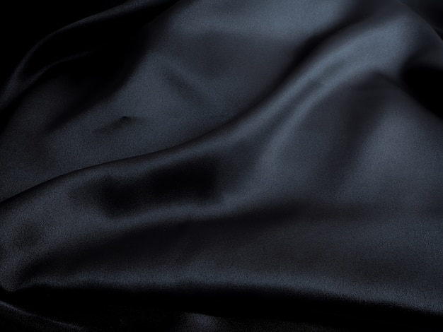 Текстурный фон из черной шелковой ткани