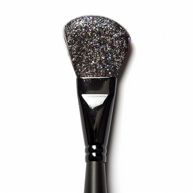 Photo a black and silver brush with a black and silver glitter on it