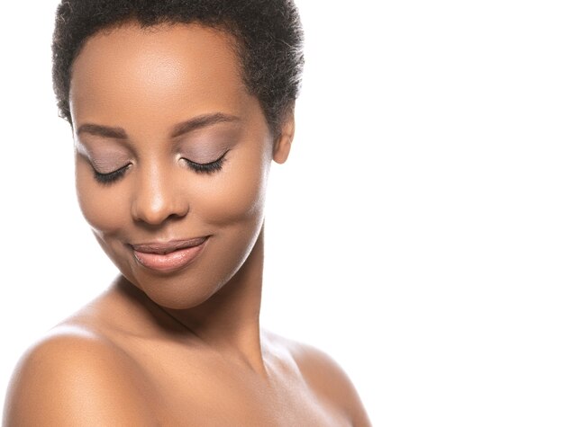 Black skin beauty woman pure natural skin afro girl isolated on white. Studio shot.