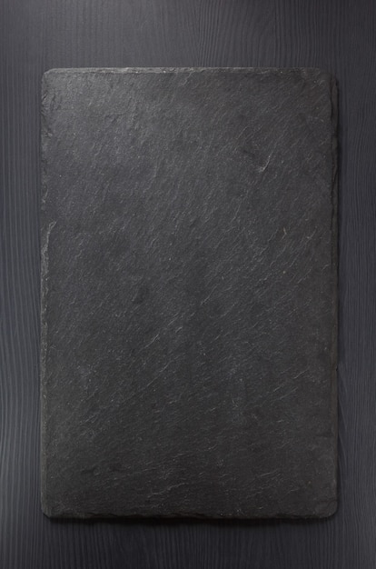 Black slate stone at wooden