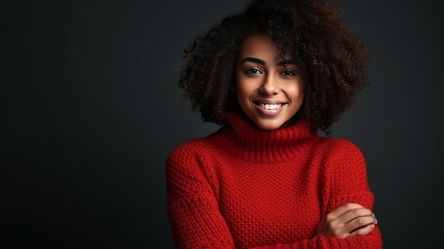 Black smiling African woman in a red sweater on a dark background on the day of the Black Friday