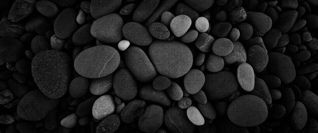 Black  smooth round pebbles background