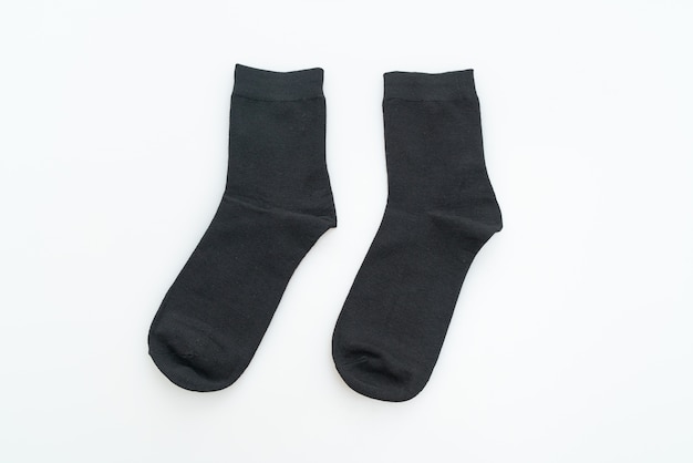 Фото Черный носок на белом