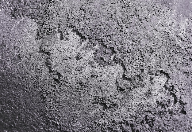 Black soot on the metal A thick layer of soot on thick metal Abstract background