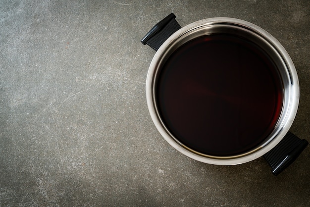 black soup in hot pot for shabu or sukiyaki - Japanese food style