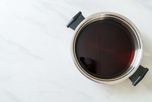 black soup in hot pot for shabu or sukiyaki - Japanese food style