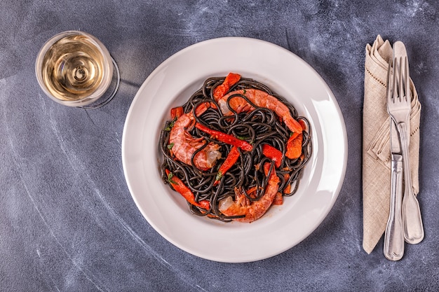 Black spaghetti with prawns and vegetables