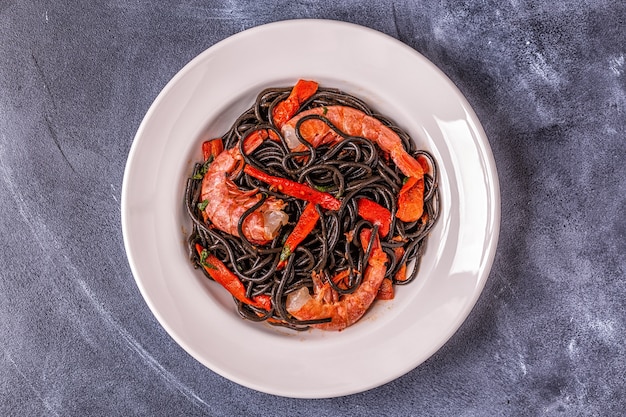 Black spaghetti with prawns and vegetables