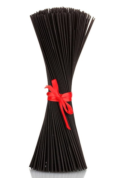 Black spaghetti with ribbon isolated on white