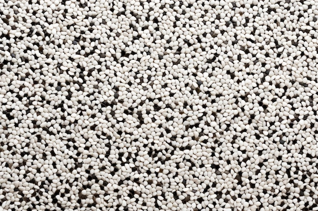 Black specks on a white background