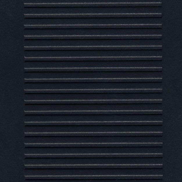 Foto fondo nero di struttura della maglia d'acciaio
