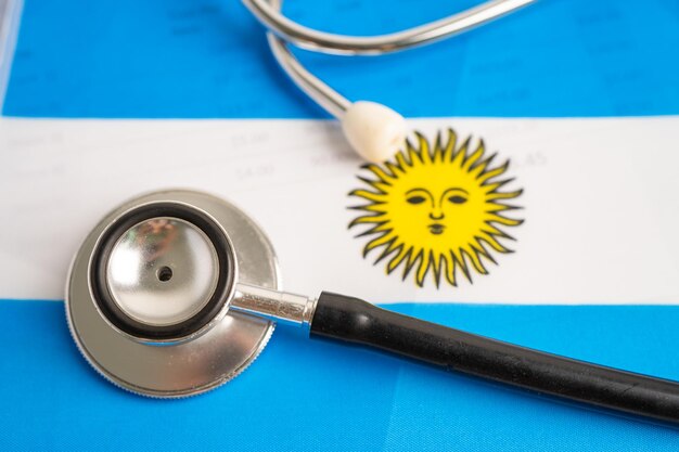 Black stethoscope on Argentina flag background Business and finance concept