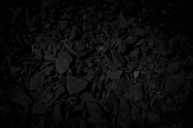 Black stone debris Rock fragment background