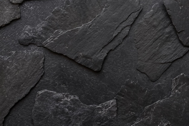 Photo black stone surface background