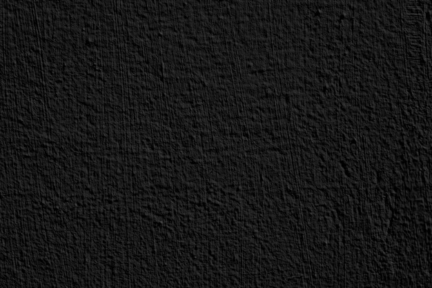 Photo black stucco texture of a wall