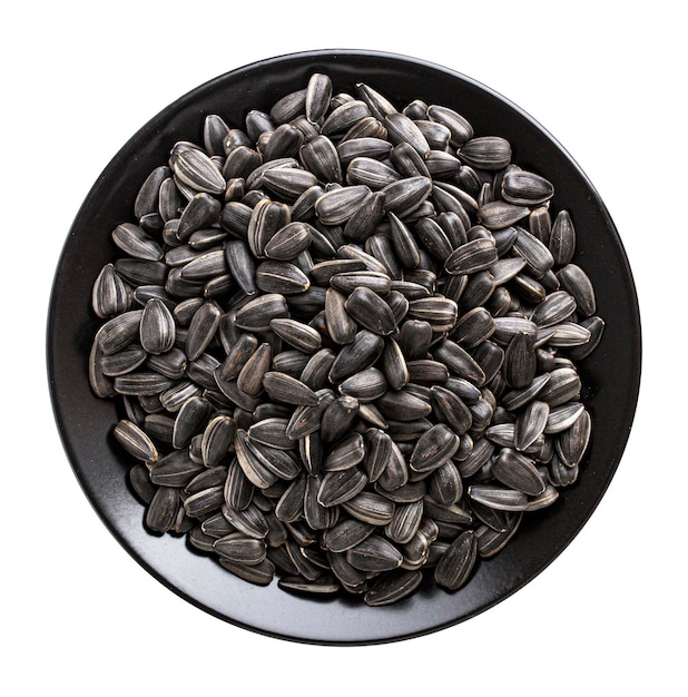 Black Sunflower seeds isolated on white top view