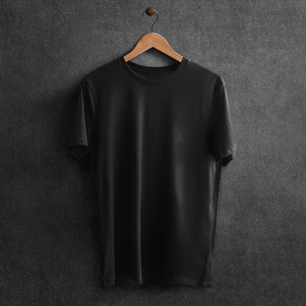 black t-shirt on a hanger with copy space