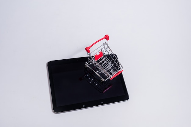 Black tablet with a metal basket