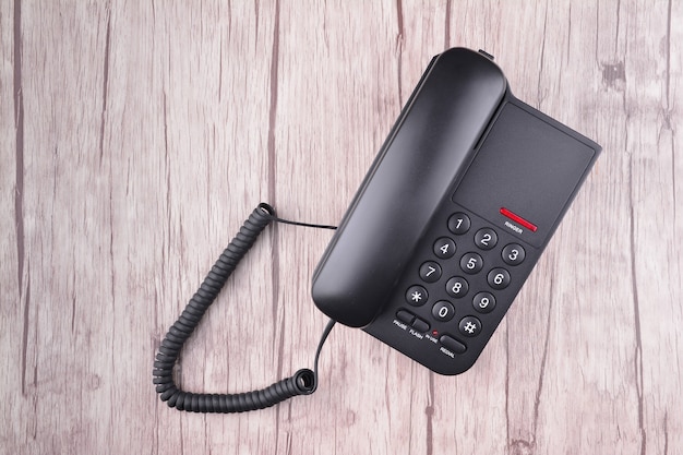 Black Telephone on wooden table