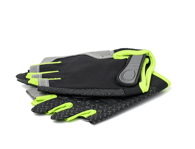 Black textile sports gloves for fitness training and cycling isolated on white background