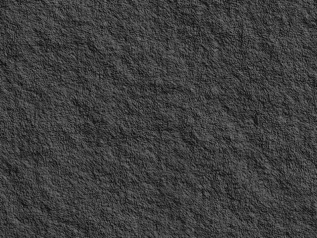 A black textured surface with a rough edge.