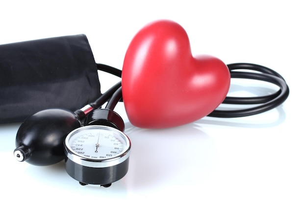 Black tonometer and heart isolated on white