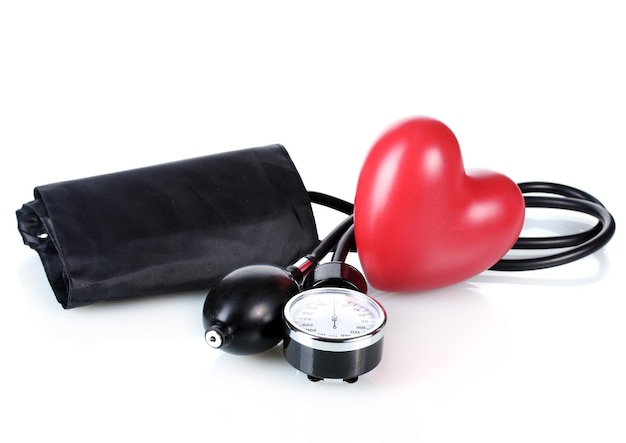 Black tonometer and heart isolated on white