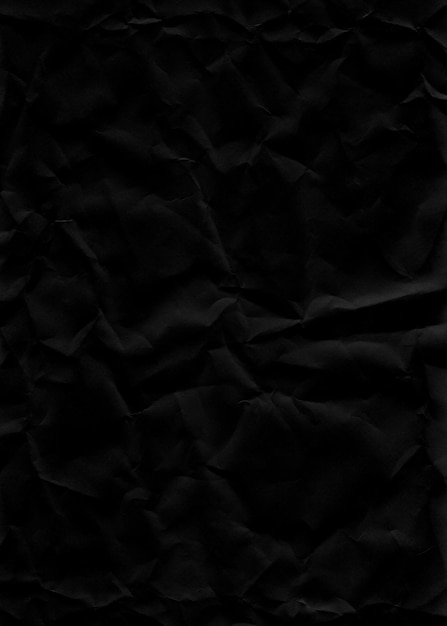 黒い紙の破れたテクスチャの背景