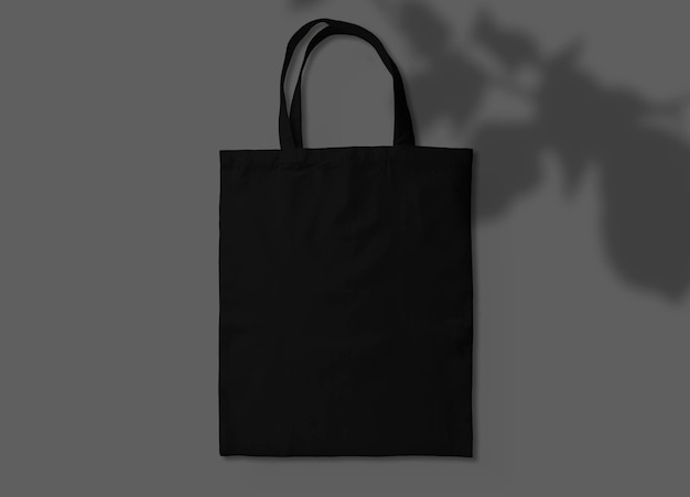 Photo black tote bag with plant shadow