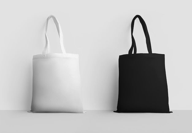 Фото Черная большая сумка для розничных покупок для дизайнерского принта. шаблон многоразовой хлопковой экосумки изолат