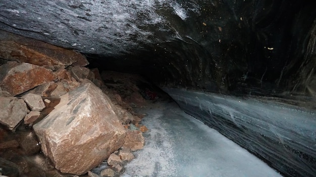 The black transparent color of ice in the cave